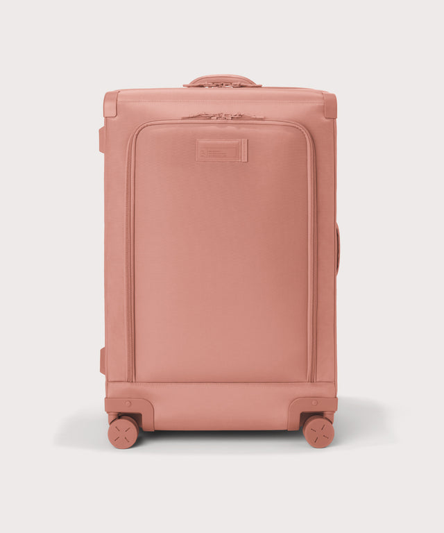 Front view of Sydney checked rolling luggage 28.5” in warm dust pink
