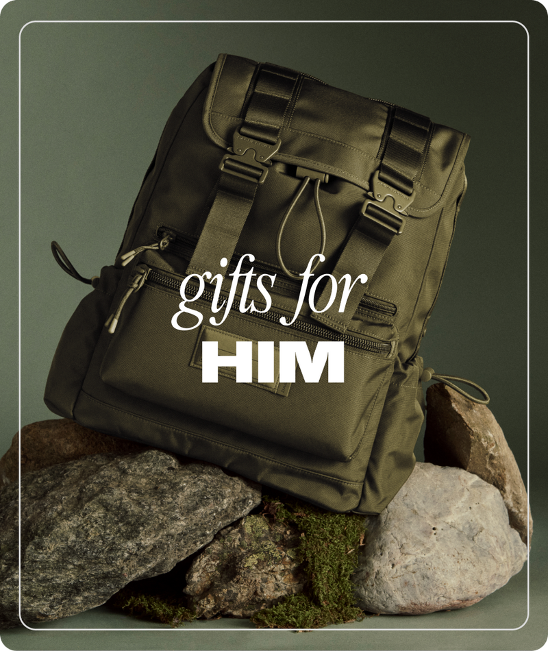 Green backpack on rocks with 'gifts for HIM' text on a green background