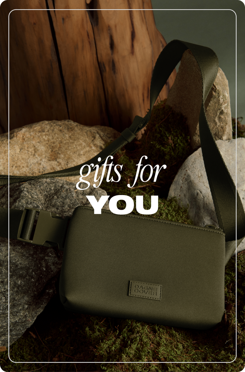 Green bag with a strap on rocks, text 'gifts for YOU' overlayed.
